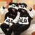 Matching Panda Onesies for Couples